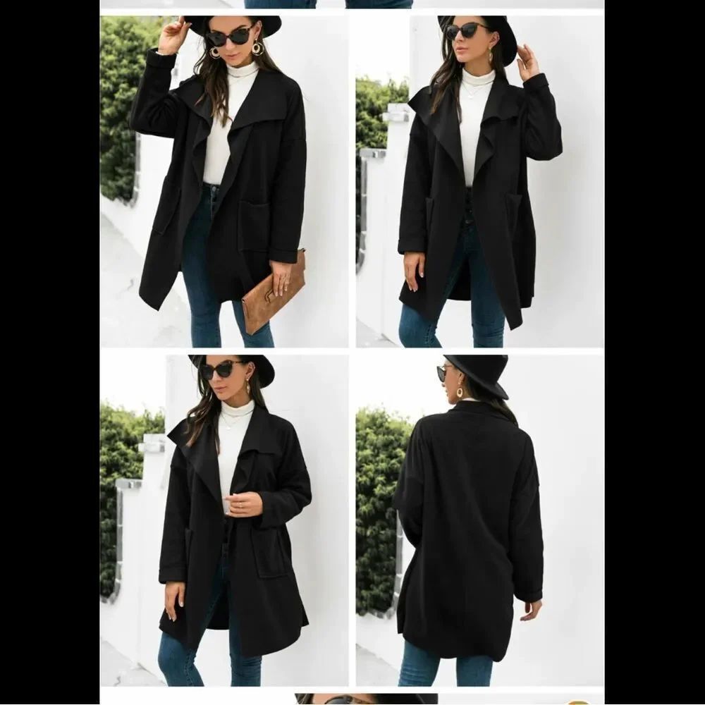 Black light weight coat with pockets. XL fits a 12 see pics for measurements.her